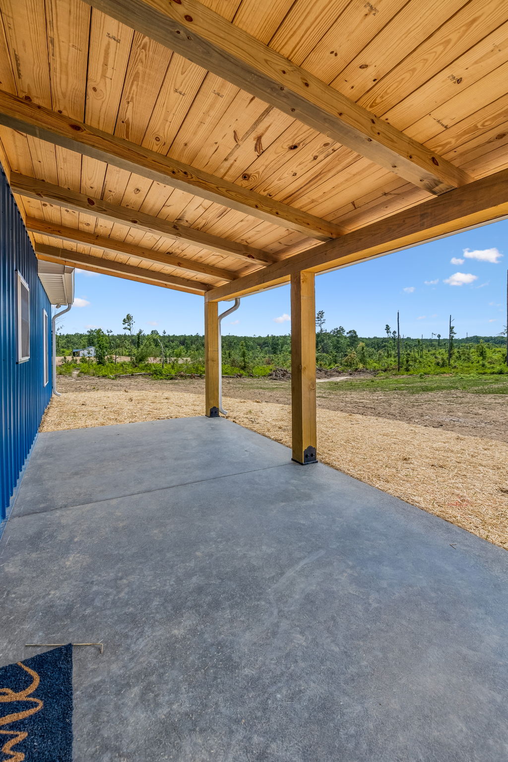 Back porch at 1855 Linden Hwy, a barndominium in Hohenwald, Tennessee