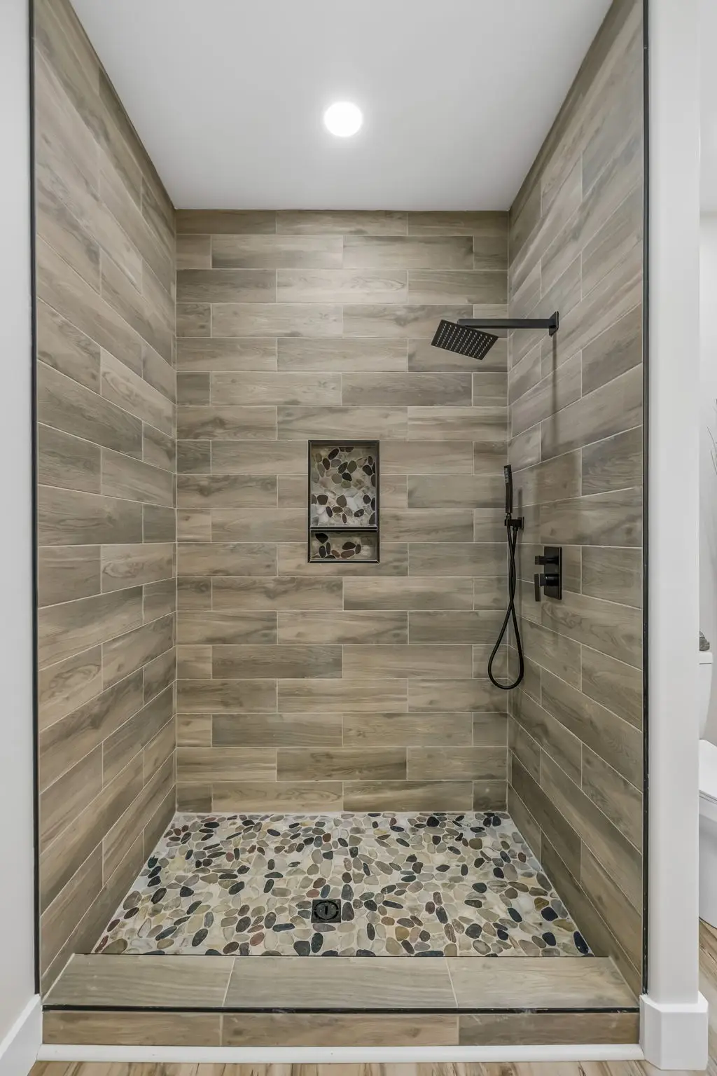 Master shower at 1855 Linden Hwy, a barndominium in Hohenwald, Tennessee