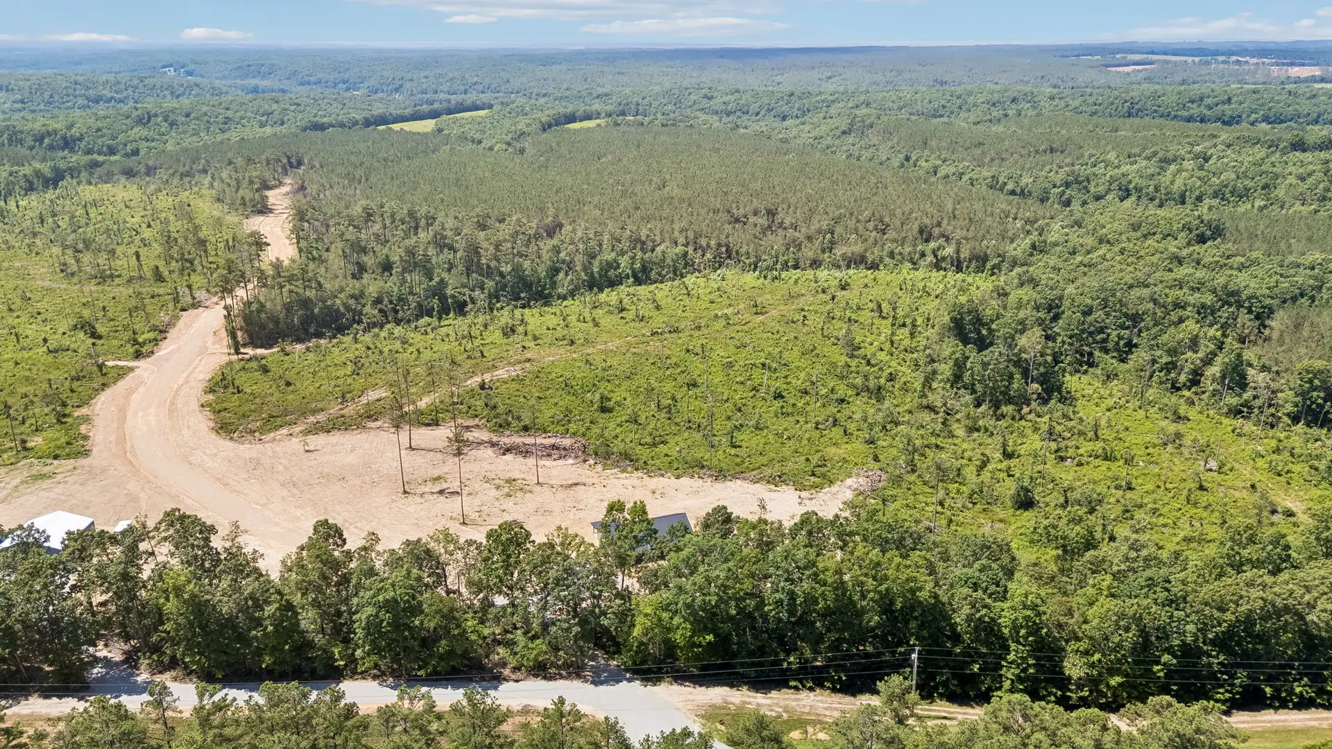 Aerial front view at 1919 Linden Hwy, a barndominium in Hohenwald, Tennessee