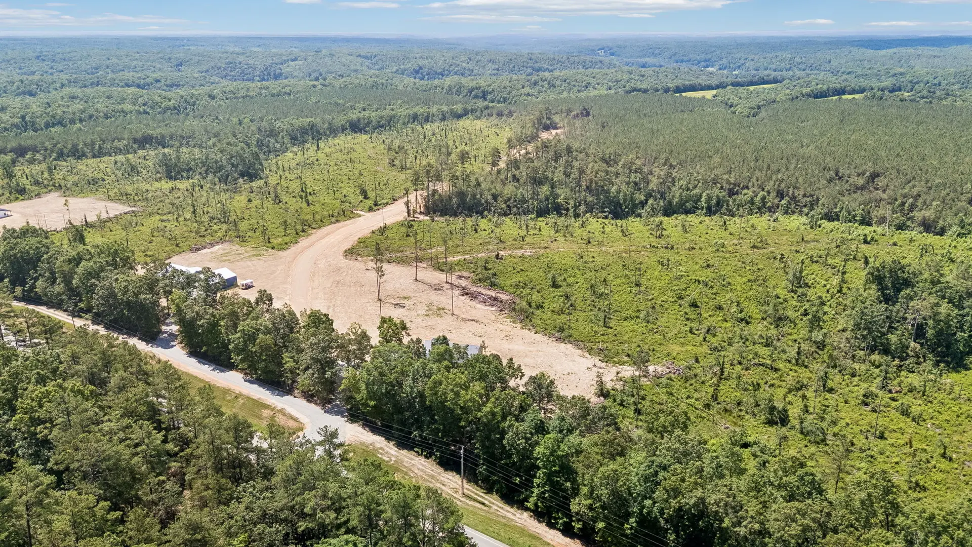 Aerial highway view at 1919 Linden Hwy, a barndominium in Hohenwald, Tennessee