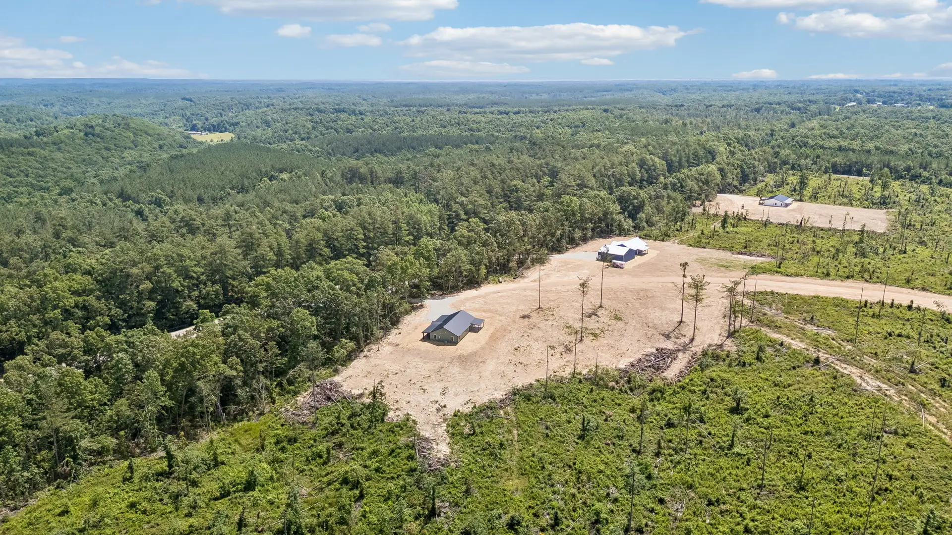 Aerial primary at 1919 Linden Hwy, a barndominium in Hohenwald, Tennessee