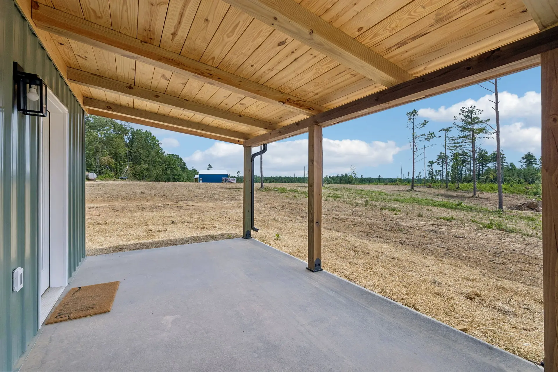 Back porch at 1919 Linden Hwy, a barndominium in Hohenwald, Tennessee
