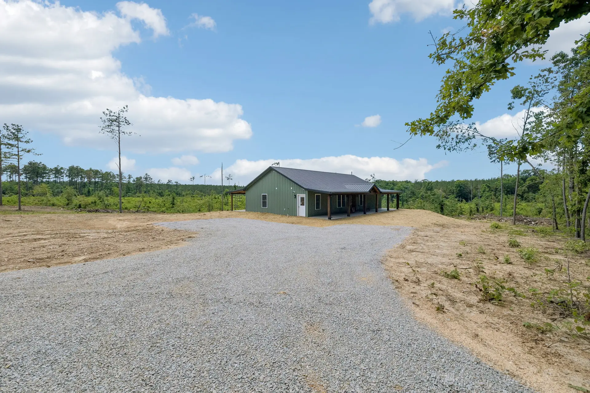 Driveway at 1919 Linden Hwy, a barndominium in Hohenwald, Tennessee
