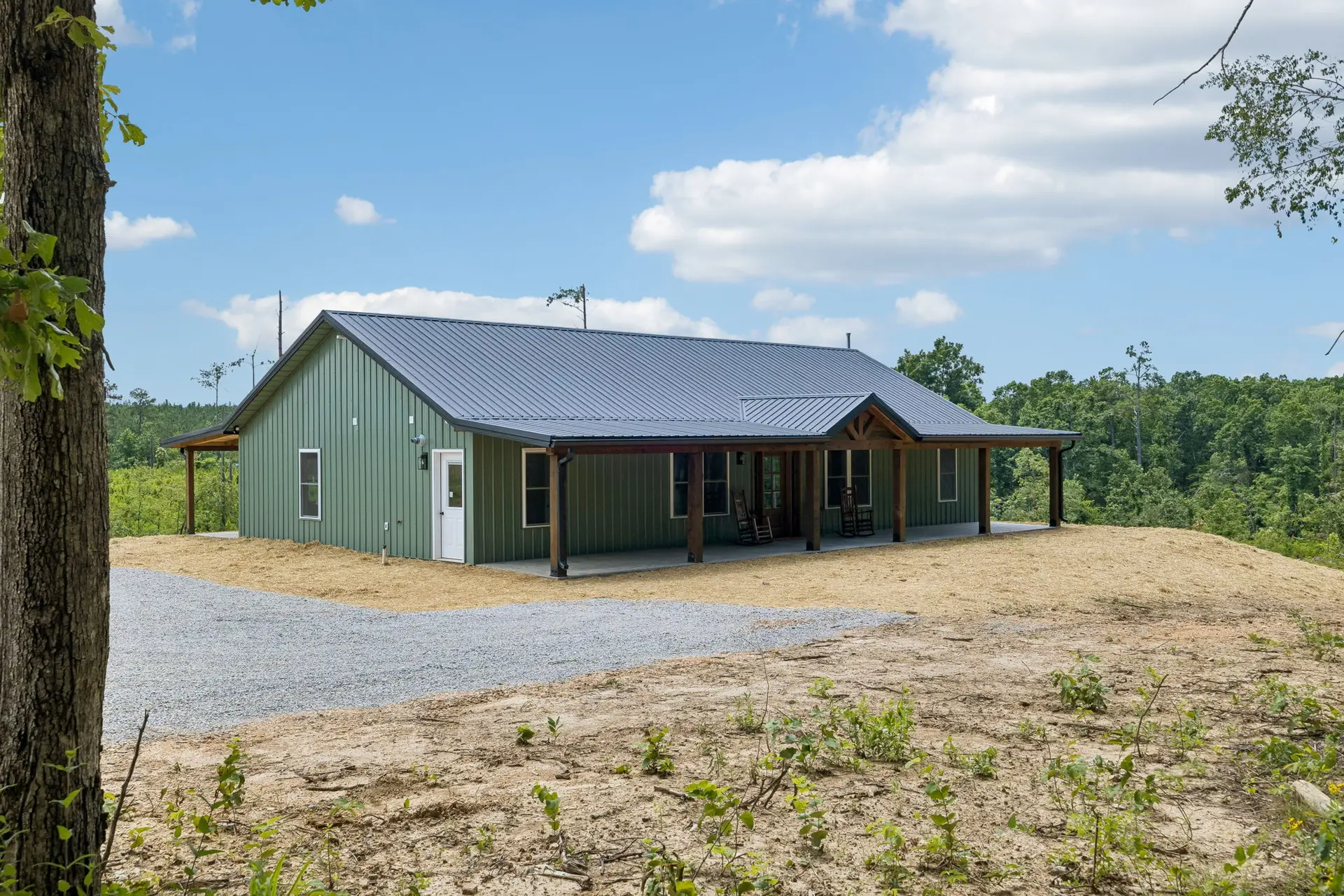 Exterior side profile at 1919 Linden Hwy, a barndominium in Hohenwald, Tennessee