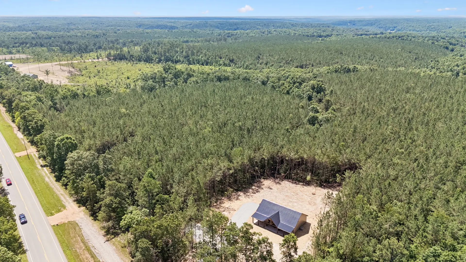 Aerial highway at 1975 Linden Hwy, a barndominium in Hohenwald, Tennessee