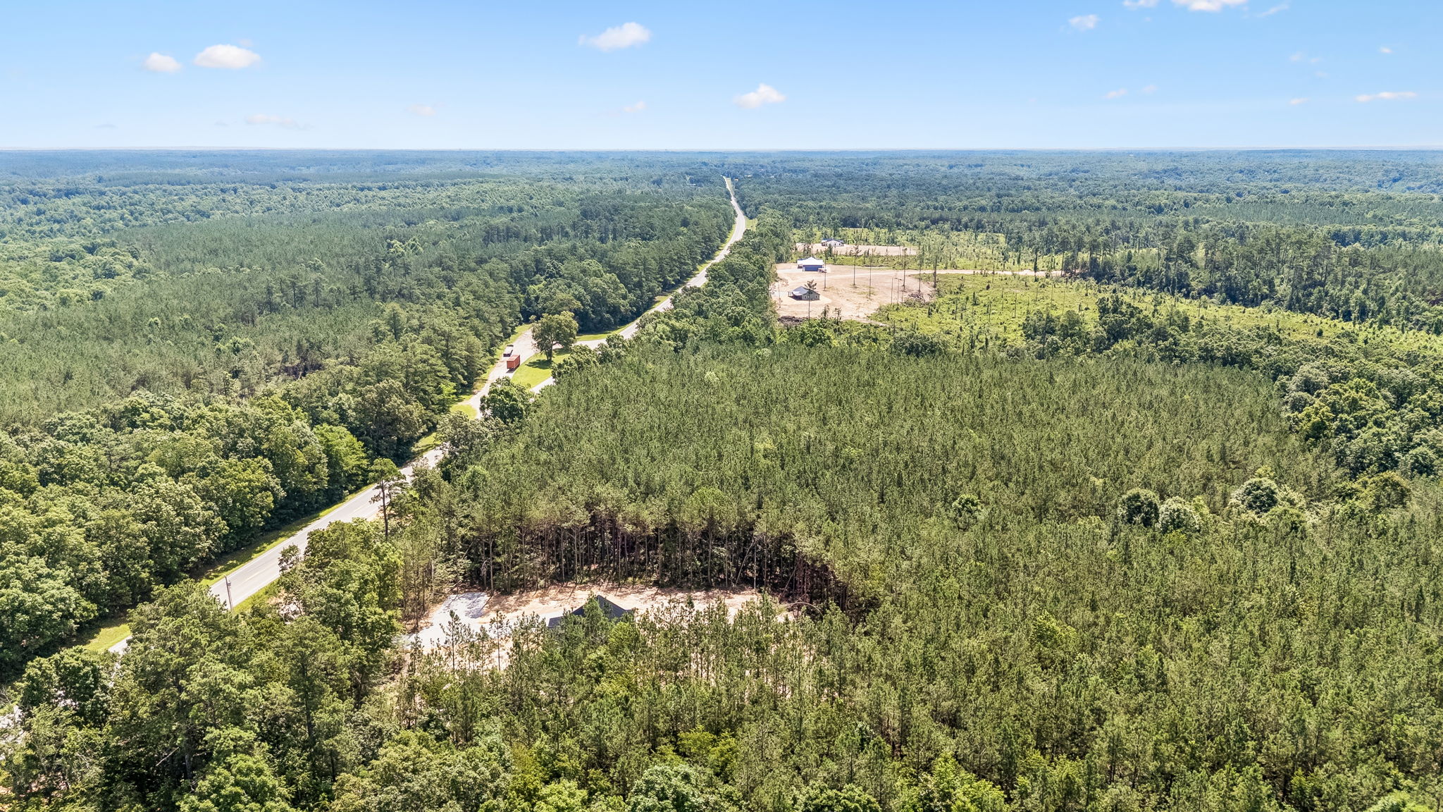 Aerial side view at 1975 Linden Hwy, a barndominium in Hohenwald, Tennessee