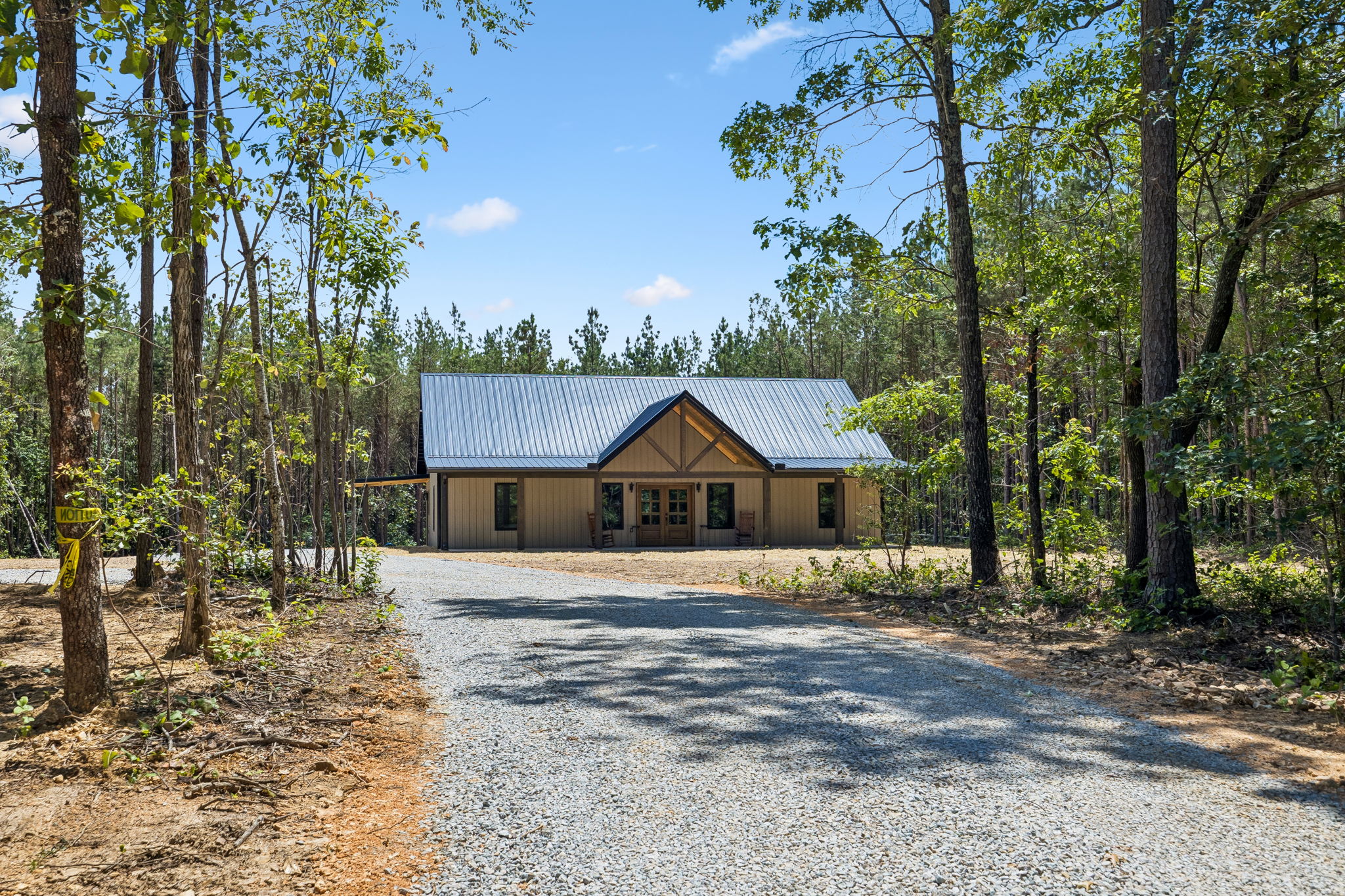 Driveway at 1975 Linden Hwy, a barndominium in Hohenwald, Tennessee