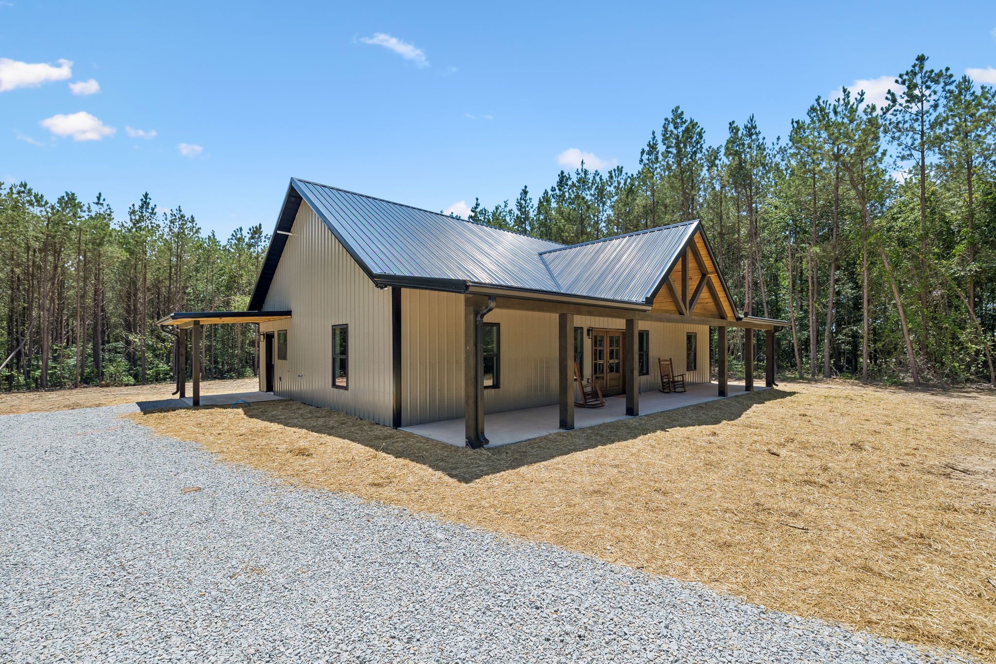 Primary exterior side view at 1975 Linden Hwy, a barndominium in Hohenwald, Tennessee